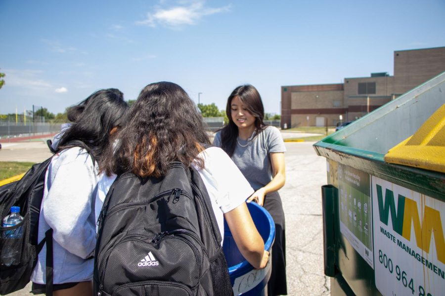 Senior Alicia Pham volunteers by recycling with KAY Club, Aug. 25. 