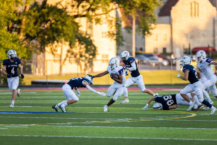 Senior Grant Stubblefield (#2) scored three touchdowns and gained 281 yards in the varsity football game against Saint James, Sept. 2. 
