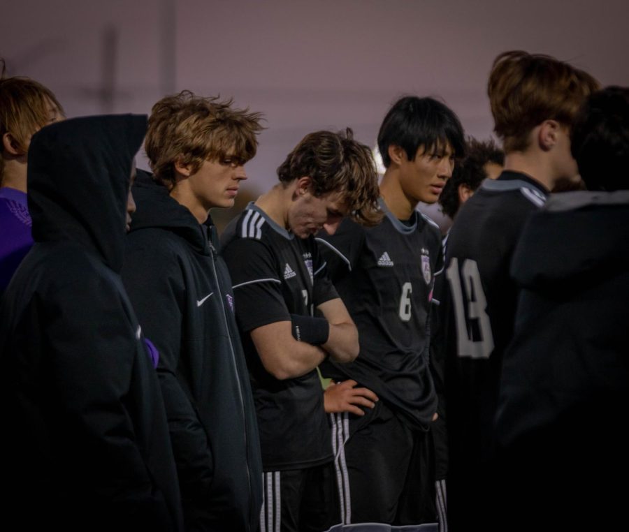 The boys varsity soccer team talks after losing their substate game against Olathe South, Oct. 25.