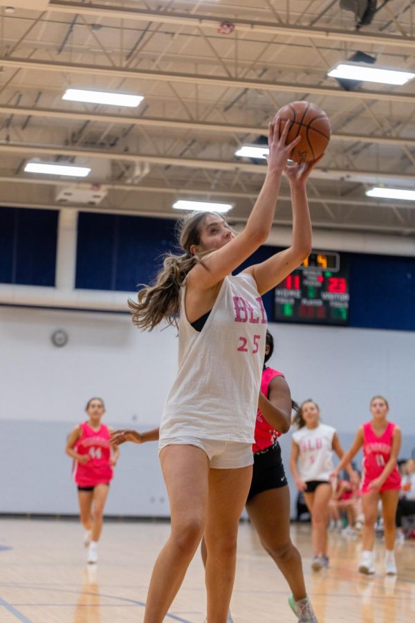 Senior Brick Laying Ballers player Gabbie Troutner attempts a basket during their game against the Reboundz, Feb. 12.