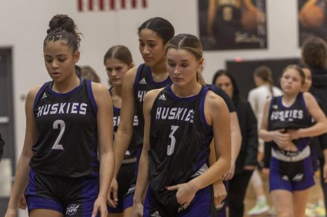 Juniors Ava Smith (3) and Tamia Davis (2) walk out of the gym after losing to the BVHS Tigers in the Sub-State semifinals.