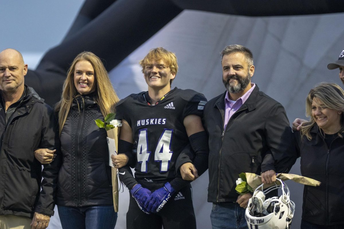 Senior football player Tyler Wells was recognized before the Huskies game against BVN.
