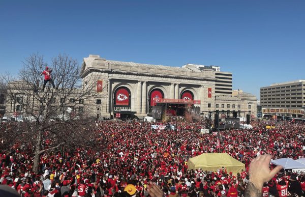 Confetti falls in front of the stage at the Chiefs celebration at Union Station minutes before shots were fired, killing at least one person and injuring numerous others.