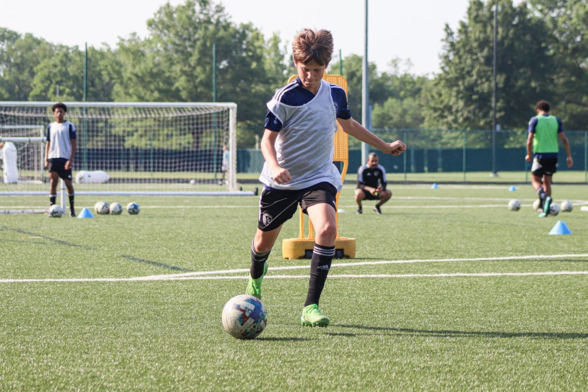 Sophomore Will Gertner does a drill during practice. “I think practice is big in helping perform in games,” Gertner said. “I have the freedom to try things and see what works so I can execute them in games.”(Photo courtesy of Sporting Kansas City).