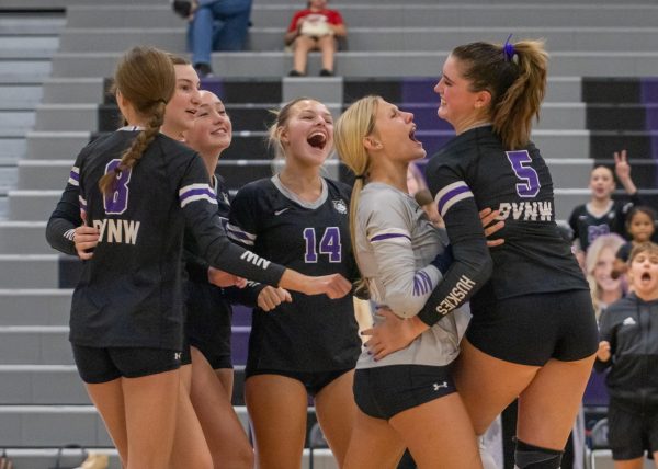 The girls' varsity volleyball team won against Olathe East on Sept. 5. Seniors Summer Anderson and Marly Burbach were honored before the game.