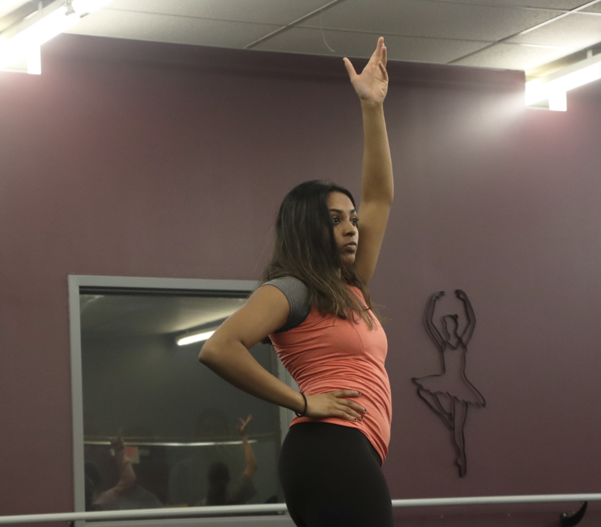 Senior Akki Gundu practicing for the Seva Dance INfusion performance Nov. 3. “[Seva Dance has] allowed me to express my love for dancing and for my culture, which I don't get to do a lot, so it's kind of special,” Gundu said.
