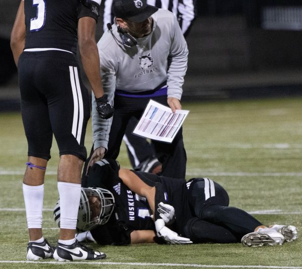 A major injury puts an end to an athlete's season. Junior Max Moser, defensive back on the varsity football team, fractured the head of his ulna and dislocated his elbow during the first playoff game this season. "We work so hard to be able to go out there and play to the best of our ability and to not be able to play is frustrating," Max said. "I wasn't even that mad about my injury, I’m more mad at the fact that I can’t play."