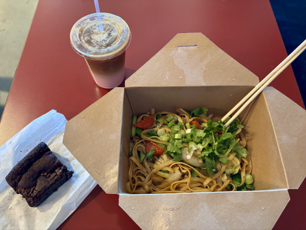 Strang Hall includes six restaurants, including strang cafe which serves desserts such as the brownie and coffee drinks such as the iced white chocolate raspberry macchiato, pictured above. Another restaurant is anousone, which serves the Stir Fry with noodles and curry chicken.