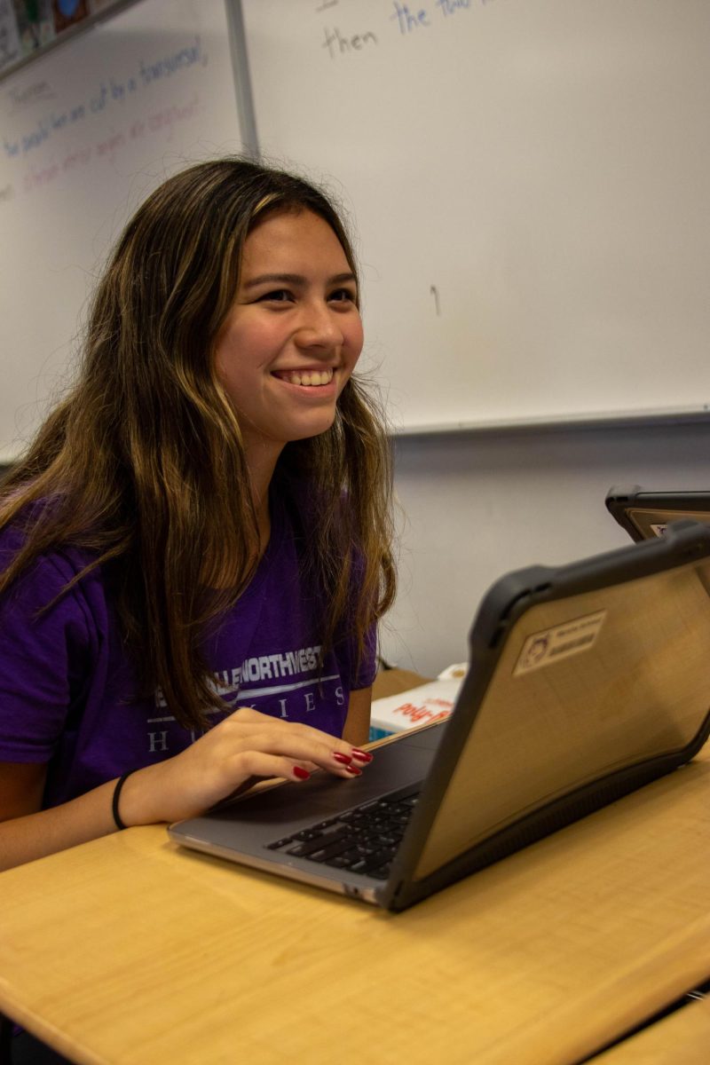 While in class, freshman Marsha Schreur works on an assignment. "I think more people should participate in spirit week because it provides a sense of community in school," Schreur stated.
